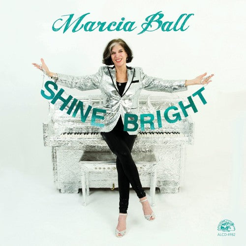 the album cover for Marcia Ball - Shine Bright