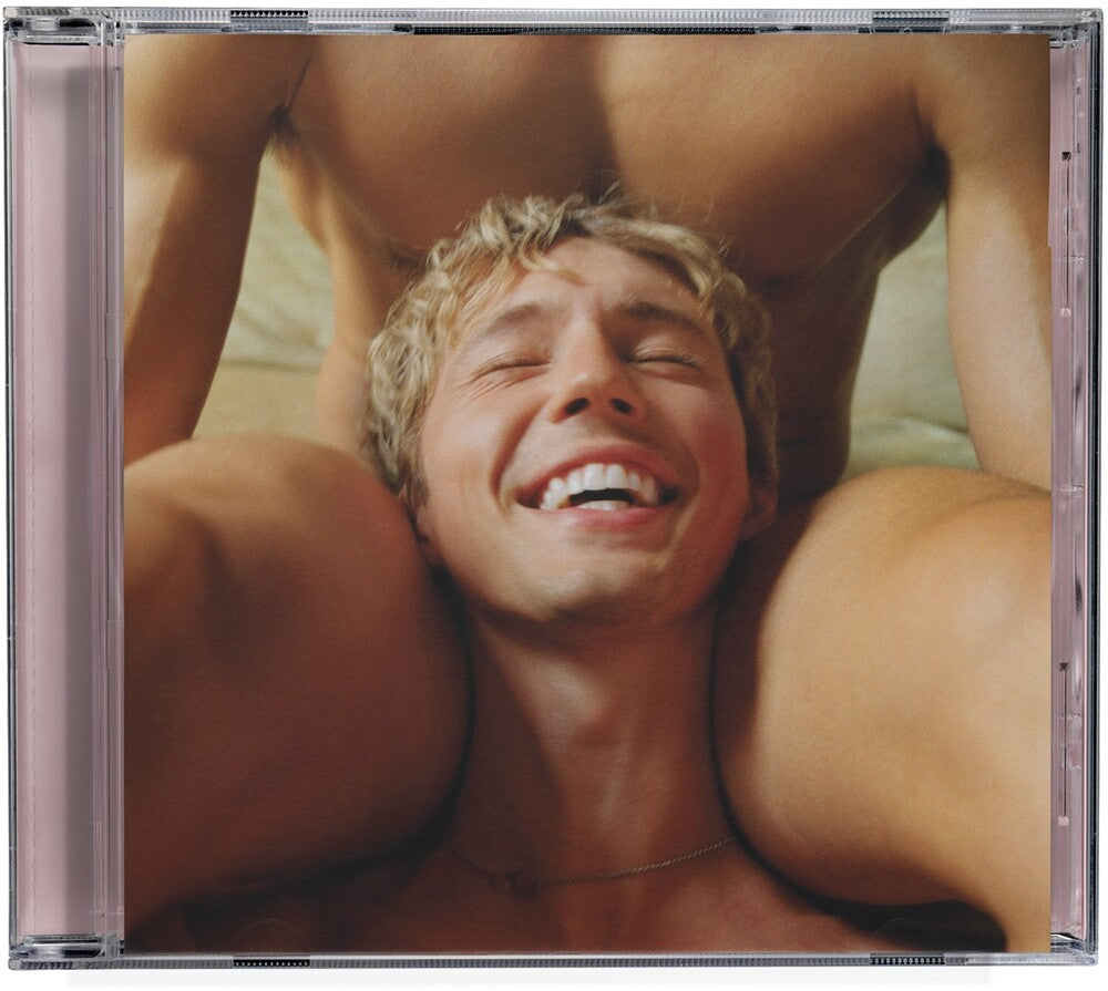 the album cover for Troye Sivan - Something To Give Each Other