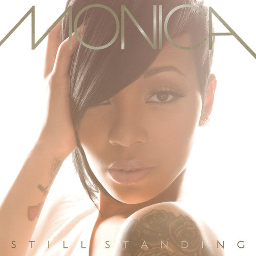 the album cover for Monica - Still Standing