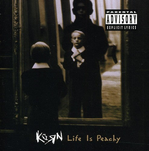 the album cover for Korn - Life Is Peachy