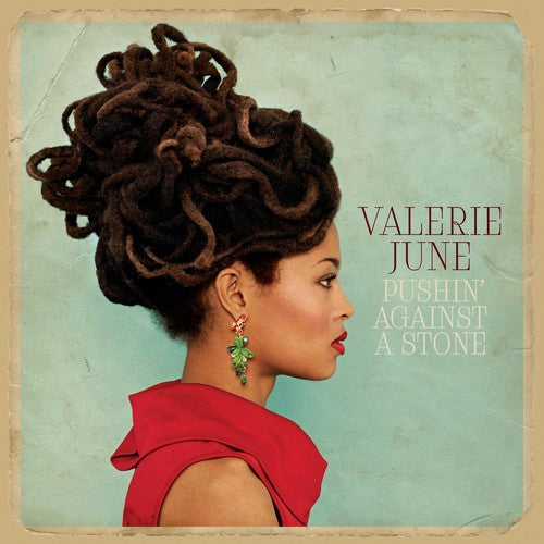 the album cover for Valerie June - Pushin Against a Stone