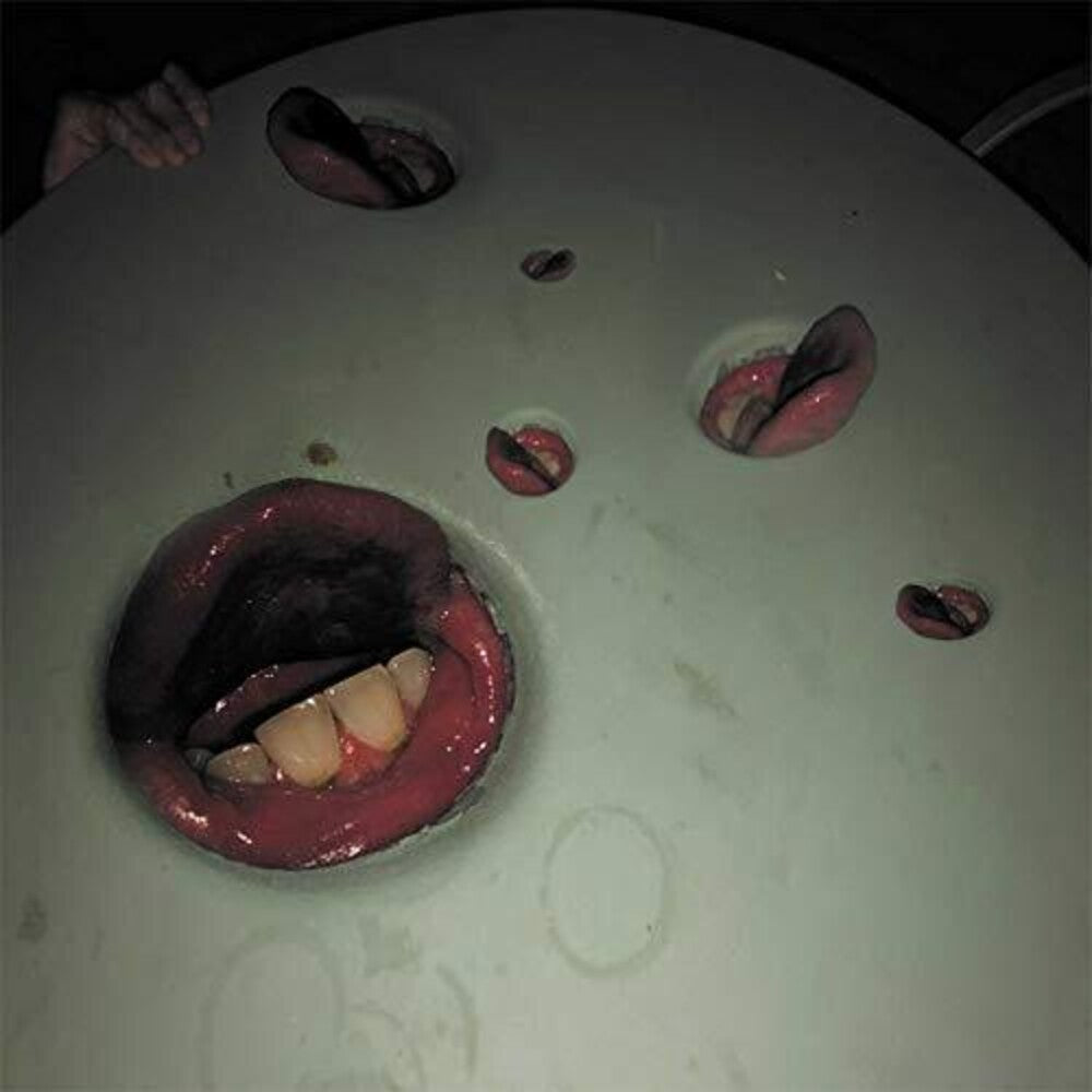 the album cover for Death Grips - Year of the Snitch [LP]
