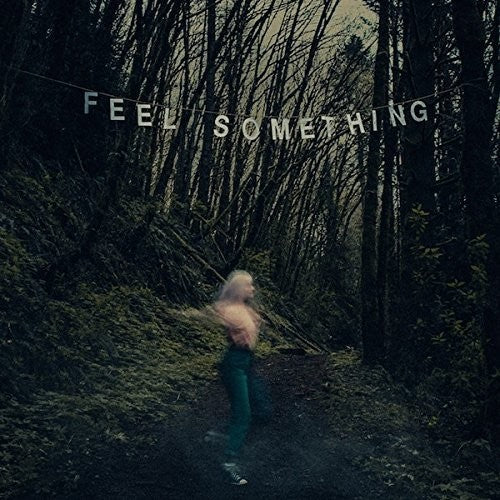 the album cover for Movements - Feel Something [Limited Edition Sangria LP]