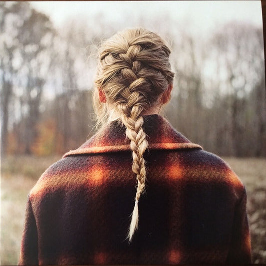 the album cover for Taylor Swift - evermore [Deluxe Green 2 LP]