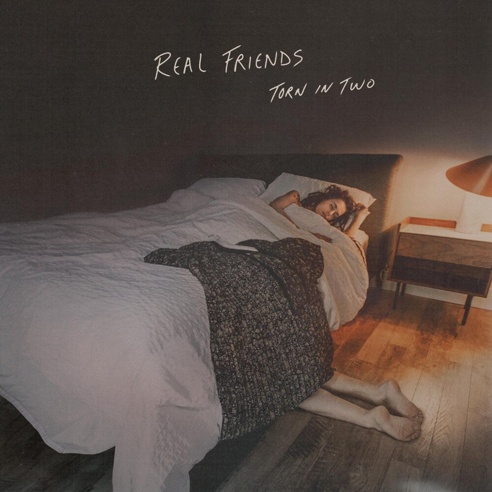 the album cover for Real Friends - Torn In Two [Indie Exclusive Limited Edition Half Electric Blue/Half Doublemint with Heavy White and Baby Pink Splatter LP]