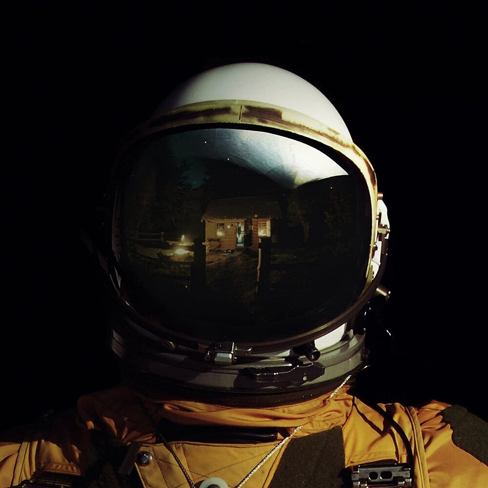 the album cover for Falling In Reverse - Coming Home [Indie Exclusive Limited Edition Gold LP]
