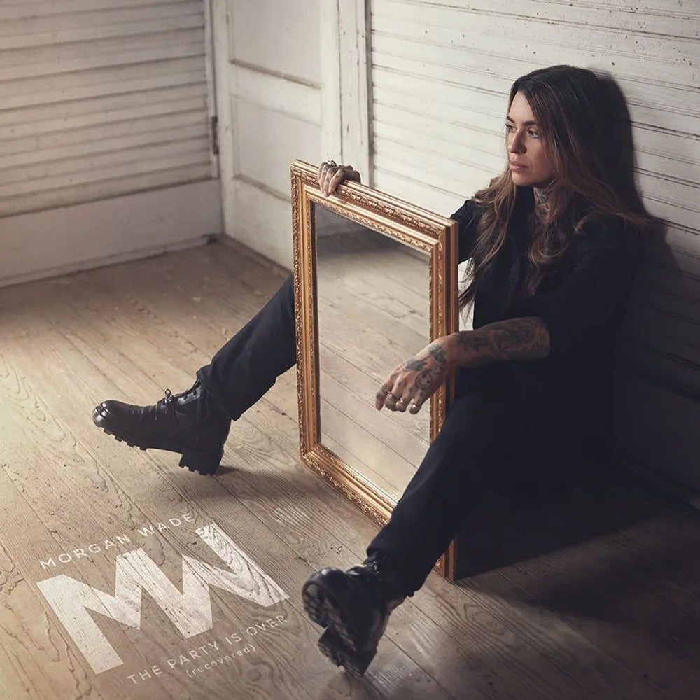 the album cover for Morgan Wade - The Party Is Over (recovered) [Indie Exclusive Sea Glass &amp; Magenta Vinyl]