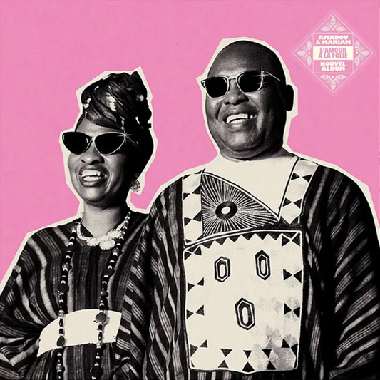 the album cover for Amadou & Mariam - L'amour A La Folie