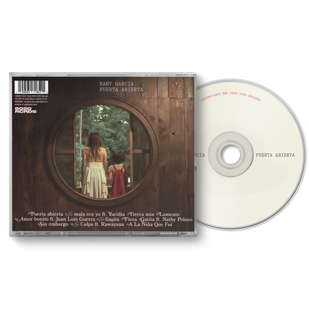 the album cover for Kany Garcia - Puerta Abierta