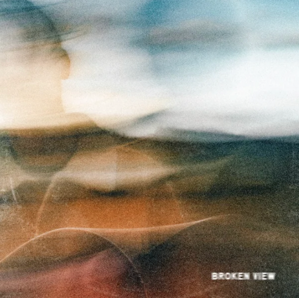 the album cover for Sam Barber - Broken View [Indie Exclusive Transparent Orange]