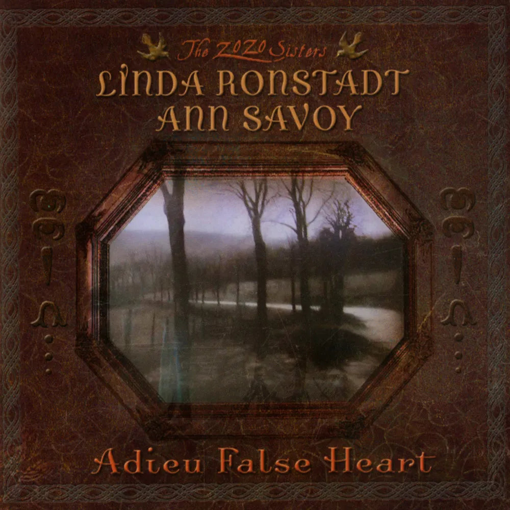 the album cover for Linda Ronstadt & Ann Savoy - Adieu False Heart - 20th Anniversary [HighTone Records]
