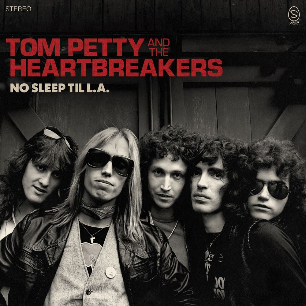 the album cover for Tom Petty And The Heartbreakers - No Sleep Til L.A. [Indie Exclusive Galaxy Ruby Translucent Black Opaque 180g]