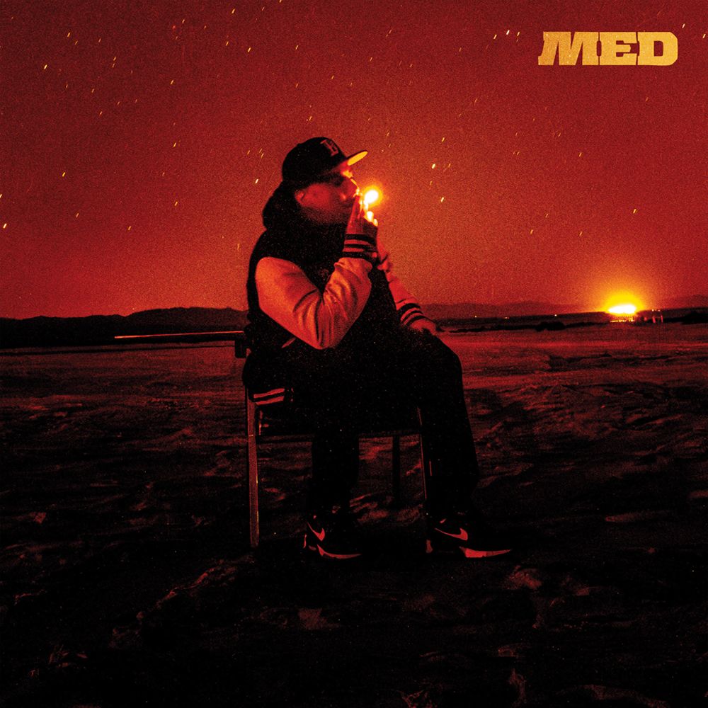 the album cover for Med - Believe And Never Grieve [Translucent Red Cassette w/ Obi Strip]