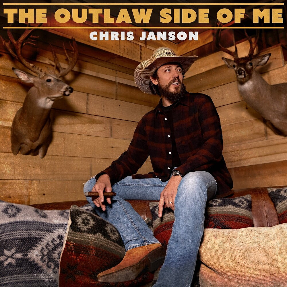 the album cover for Chris Janson - The Outlaw Side Of Me