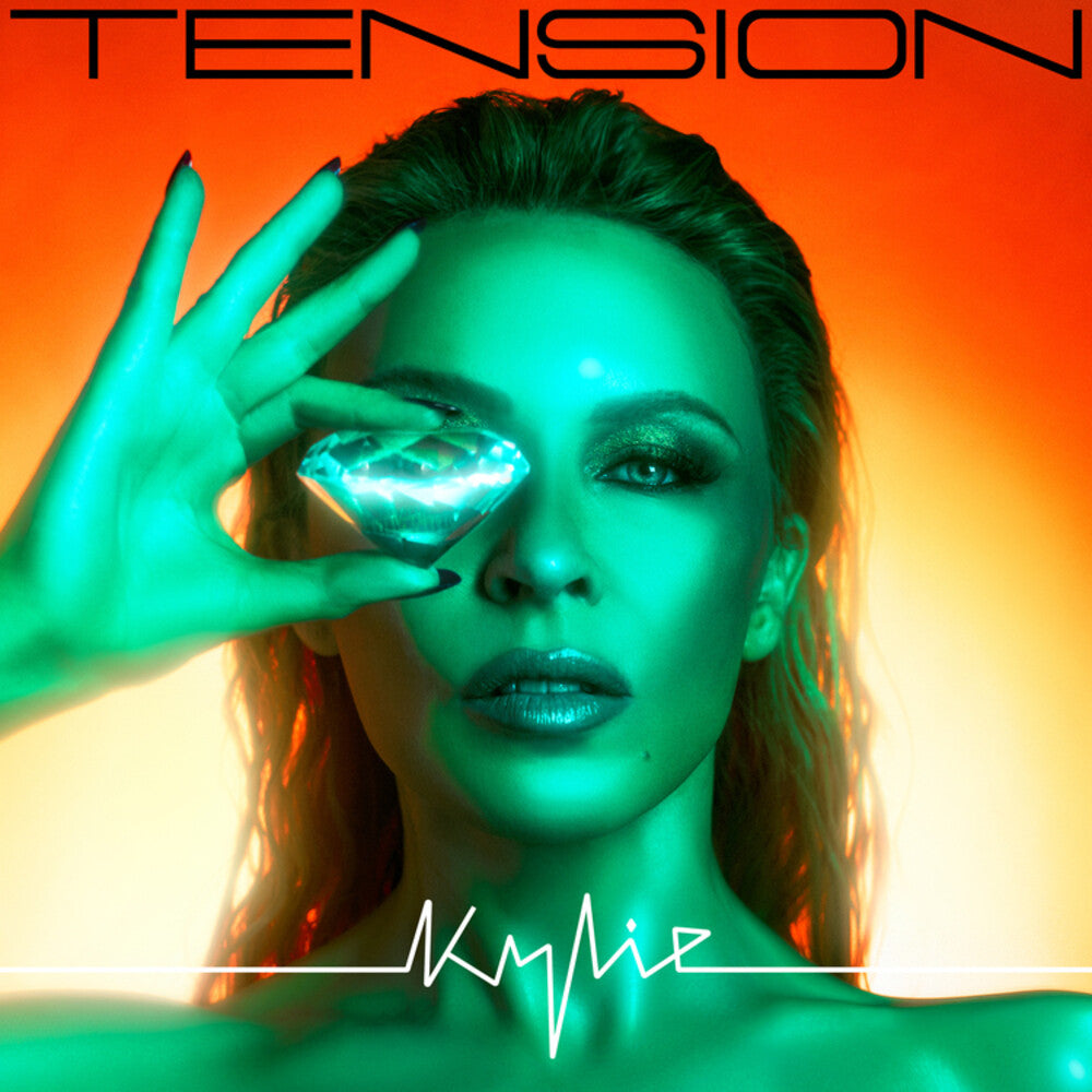 the album cover for Kylie Minogue - Tension [Limited Edition Deluxe Casebound Mediabook]