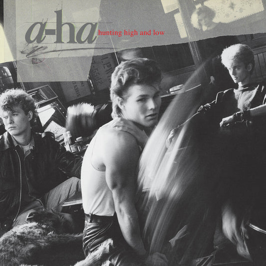 the album cover for A-Ha - Hunting High And Low [Rocktober 2023 Orange LP]