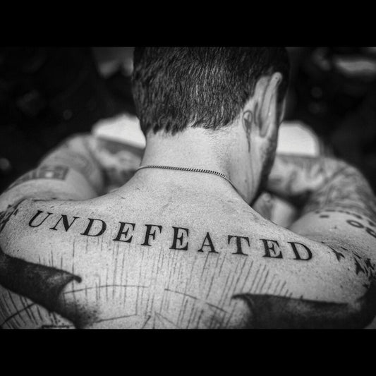 the album cover for Frank Turner - UNDEFEATED [Deluxe CD]