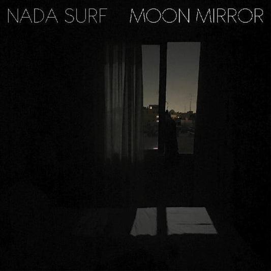 the album cover for Nada Surf - Moon Mirror [Indie Exclusive Coke Bottle Clear LP]