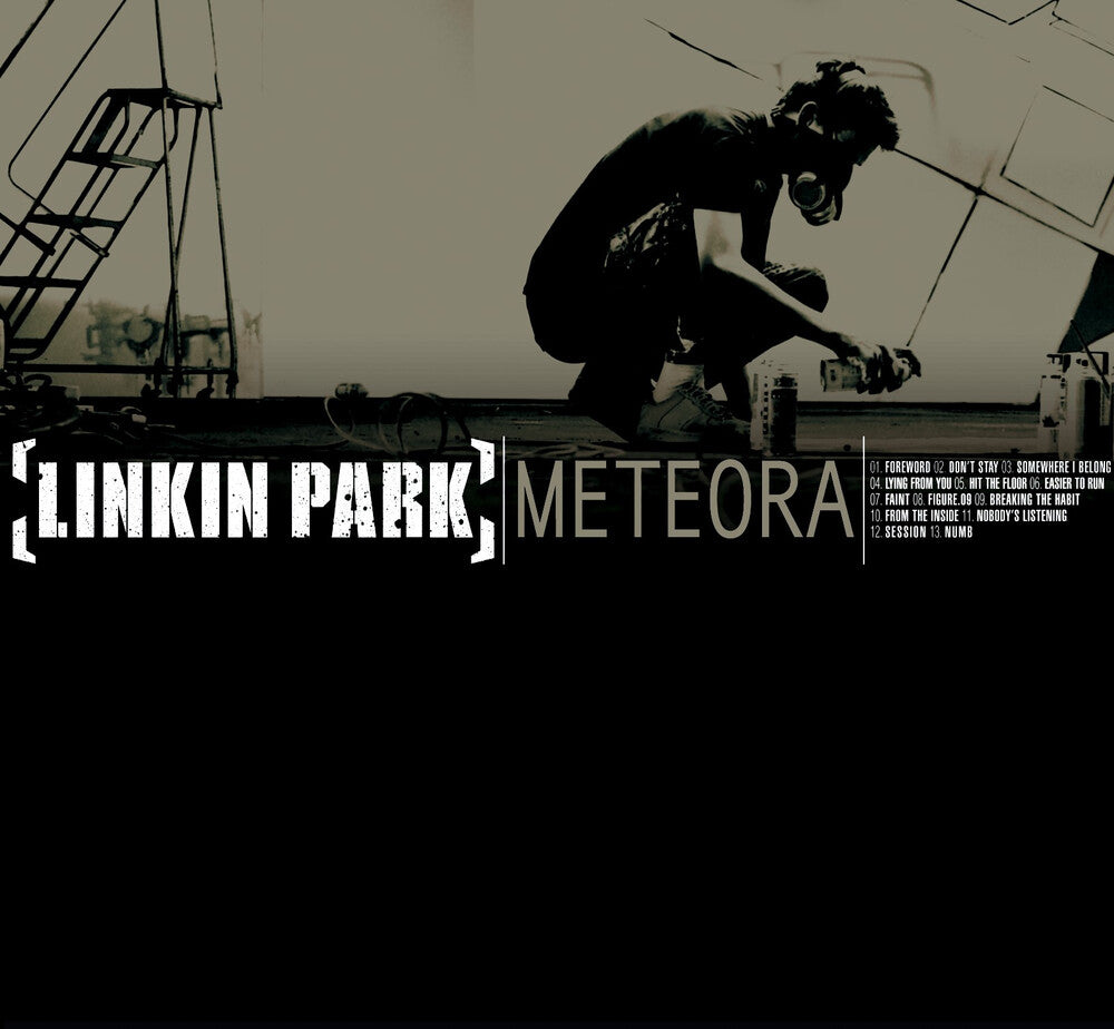 the album cover for Linkin Park - Meteora [TRANSLUCENT GOLD & RED SPLATTER LP VINYL]