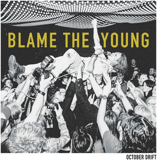 the album cover for October Drift -  Blame The Young [Indie exclusive tri-colour ]