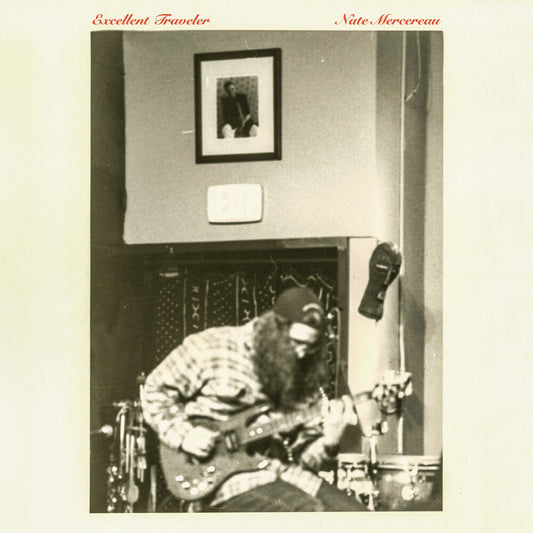 the album cover for Nate Mercereau - Excellent Traveler [Indie exclusive red]