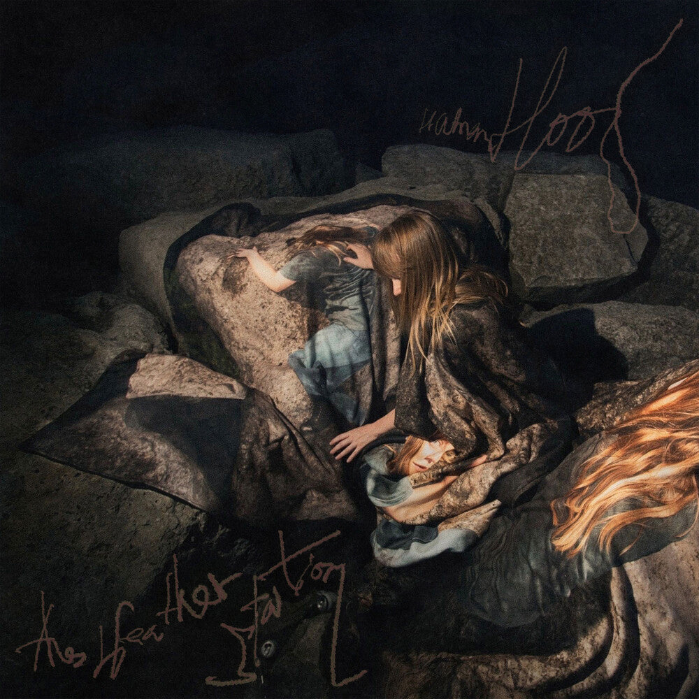 the album cover for The Weather Station - Humanhood [Indie exclusive eco red mix]