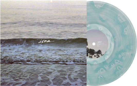 the album cover for Copeland - Ixora [Indie Exclusive] Clear & Light Blue Ghostly (Blue)