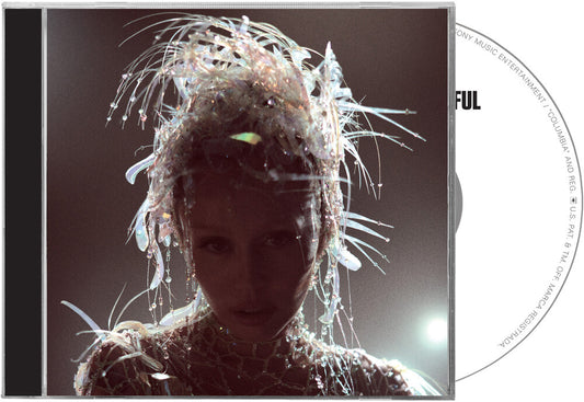 the album cover for Miley Cyrus - Something Beautiful