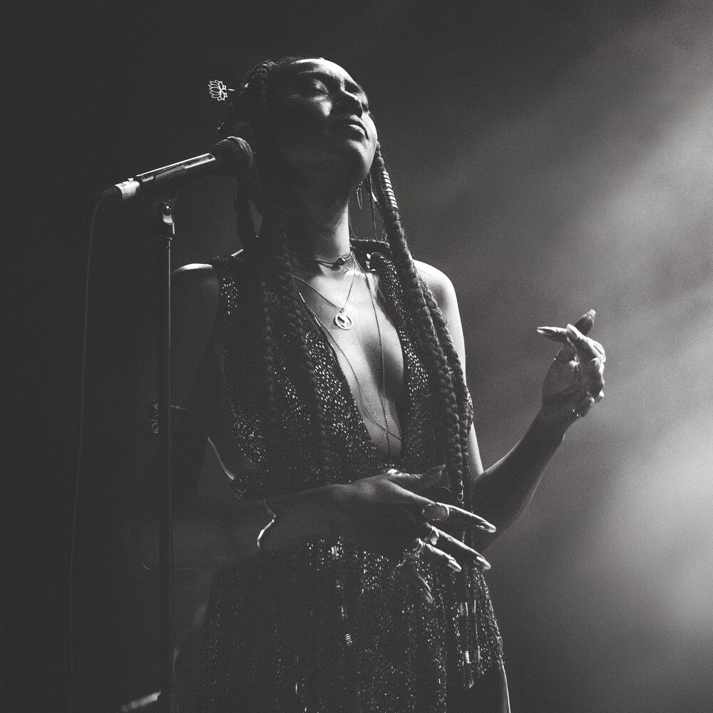 the album cover for Fils-Dominique Aime - Live At The Montreal International Jazz Festival