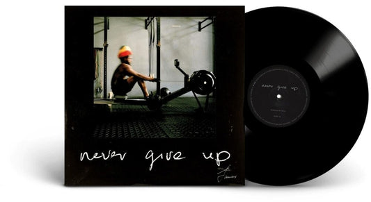 the album cover for Chronixx - Never Give Up [Indie Exclusive] [Limited Edition]
