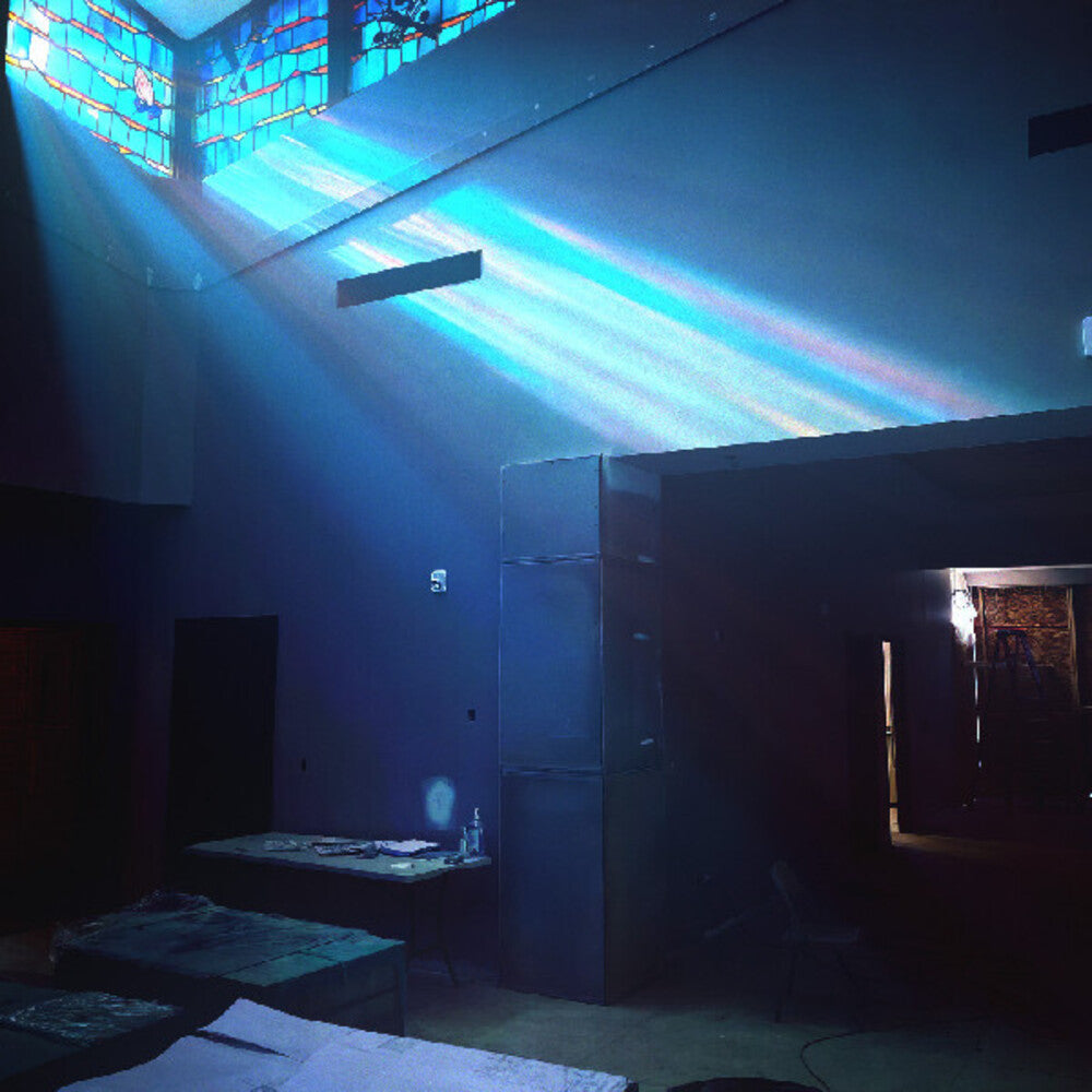 the album cover for John Maus - Later Than You Think [Indie Exclusive Ice Blue Colored Vinyl]