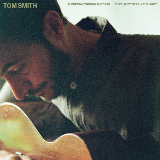 the album cover for Tom Smith - There Is Nothing In The Dark