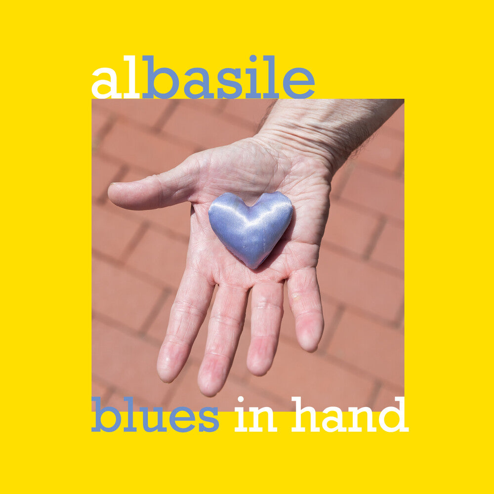 the album cover for Al Basile - Blues In Hand