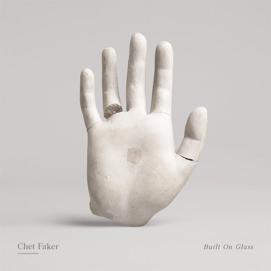 the album cover for Chet Faker - Built On Glass