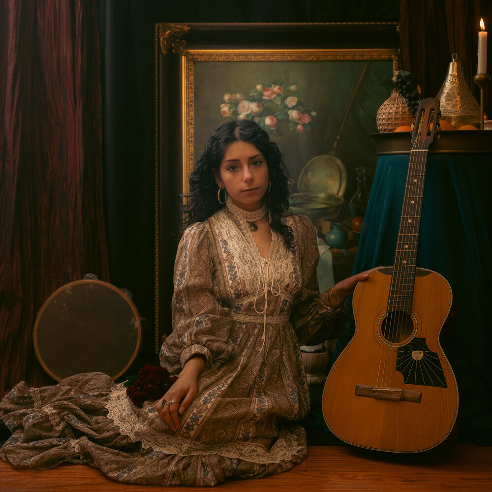 the album cover for Amanda Pascali - Roses And Basil