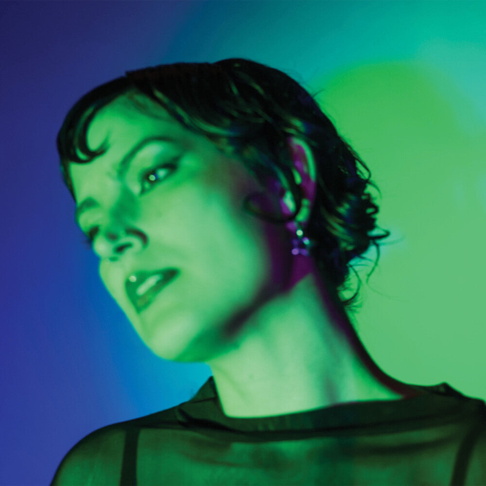 the album cover for MAURA WEAVER - Strange