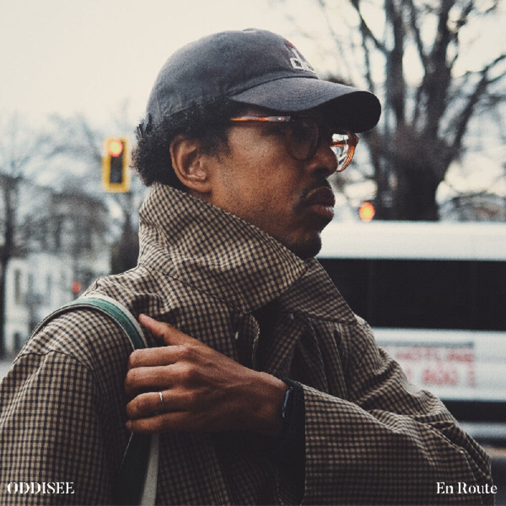 the album cover for Oddisee - En Route (Brwn) [Colored Vinyl] (Grn) [Indie Exclusive]