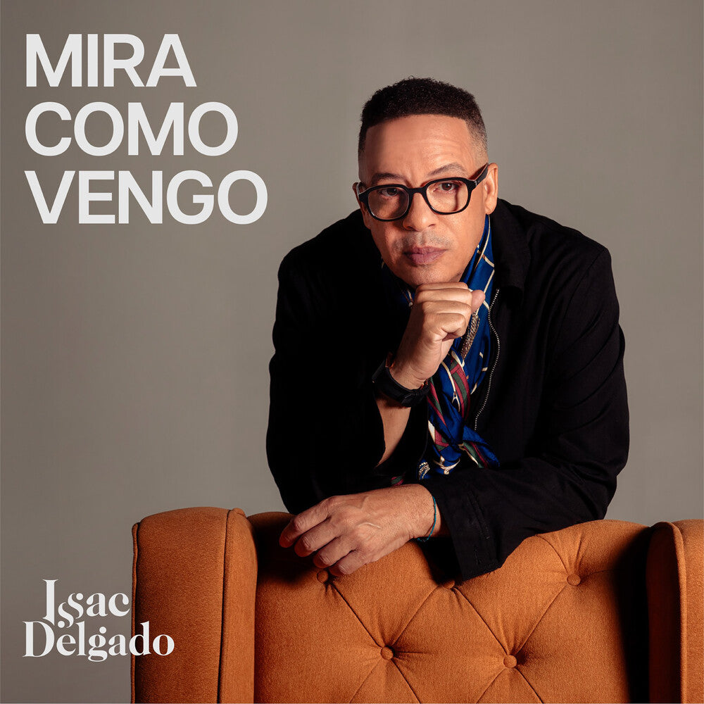 the album cover for Issac Delgado - Mira Como Vengo