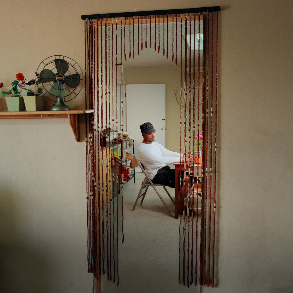 the album cover for Elujay - A Constant Charade [Ochre Vinyl LP]