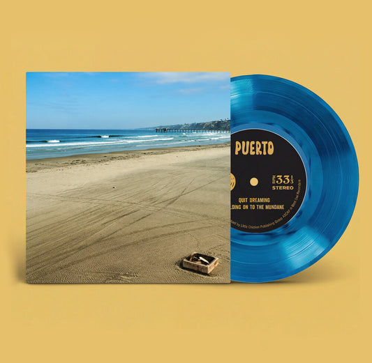 the album cover for Puerto - Quit Dreaming / Holding On To The Mundane (Blue)