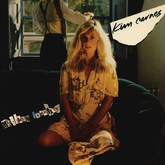 the album cover for Kim Carnes - Mistaken Identity [With Booklet] (Hol)
