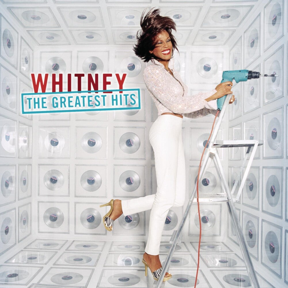the album cover for Whitney Houston - Whitney the Greatest Hits